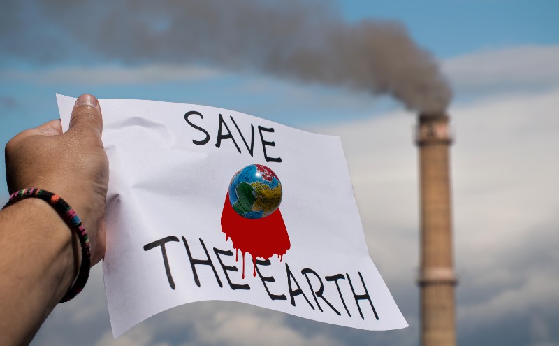 Save the Earth on the banner of a protester-End of Coal