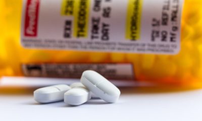 close up of a recognizable opioid pain killer | Jury Finds CVS, Walgreens, and Walmart Liable for Opioid Crisis | featured