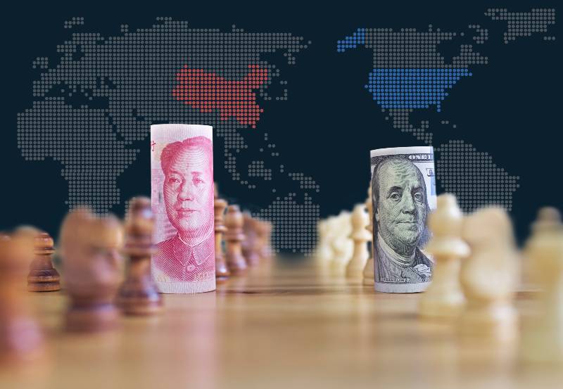 concept background of US China trade war banknotes on chess board-US Trade