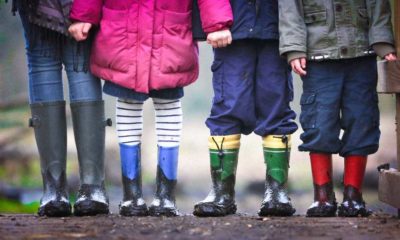 four children standing on dirt during daytime | US States Probing Instagram For Its Effects On Children | featured