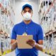 happy indian delivery man in blue uniform wearing face protective mask | There Are 3 Types of Pandemic Workers. Which One Are You? | featured