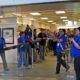 Apple employees greet customers on Ipad launch | Apple Delays Return to the Office, Gives Workers $1,000 Each | featured
