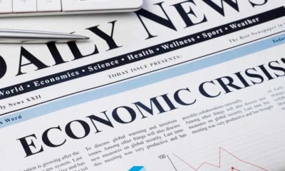 Economic crisis headline on newspaper | Survival Economic Collapse: 16 Practical Ways to Survive An Economic Crisis | featured