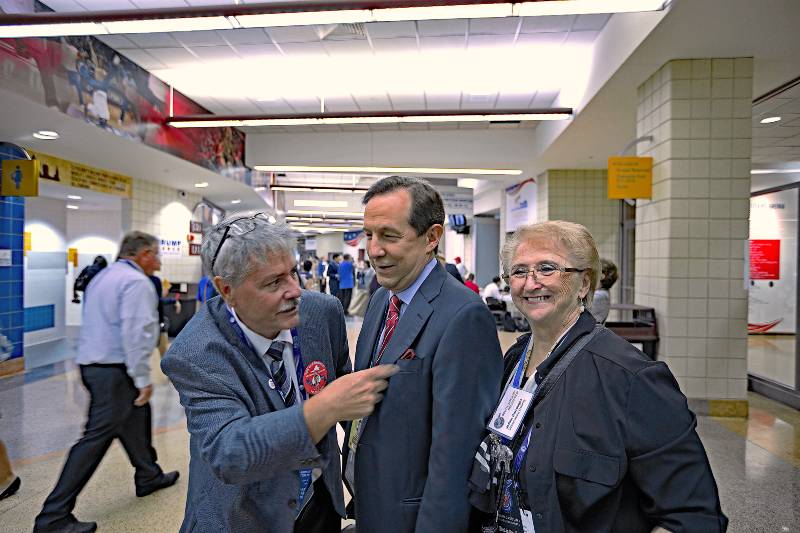 Fox News anchor stops for a photo with two delegates in the hallway of the Quicken Arena | Chris Wallace