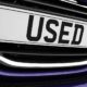 Number plate of a used car for retail sale on a motor dealers | Used Car Prices Are Rising Faster Than Bitcoin | featured