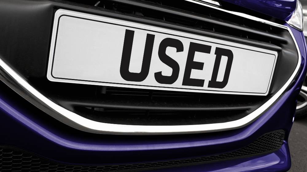 Number plate of a used cars for retail sale on a motor dealers | Used Car Prices Are Rising Faster Than Bitcoin | featured