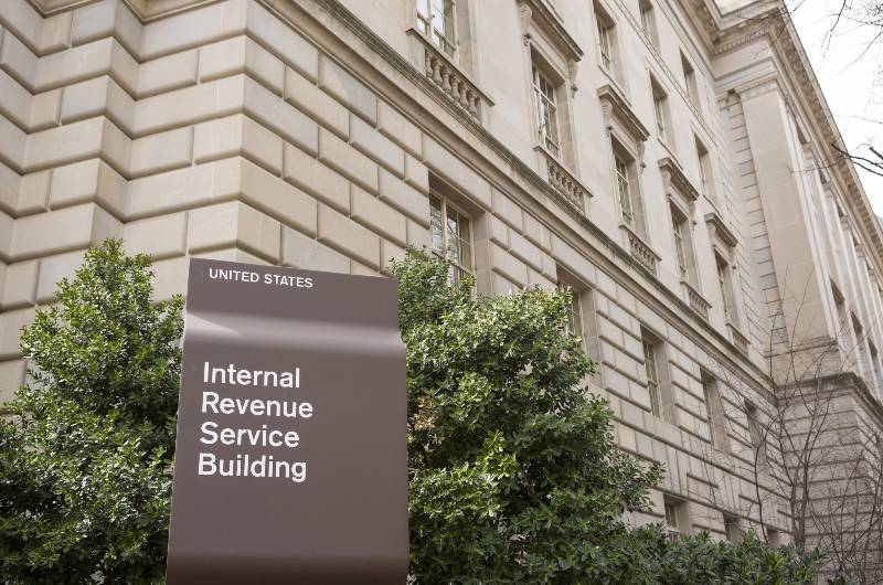 IRS building sign. Internal Revenue Service | Report Transactions