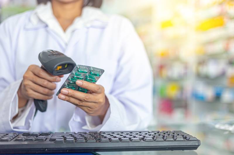 Pharmacist is scanning barcode of medicine in a pharmacy drugstore | Drug Prices Rose by 6.6% On Average In January Alone