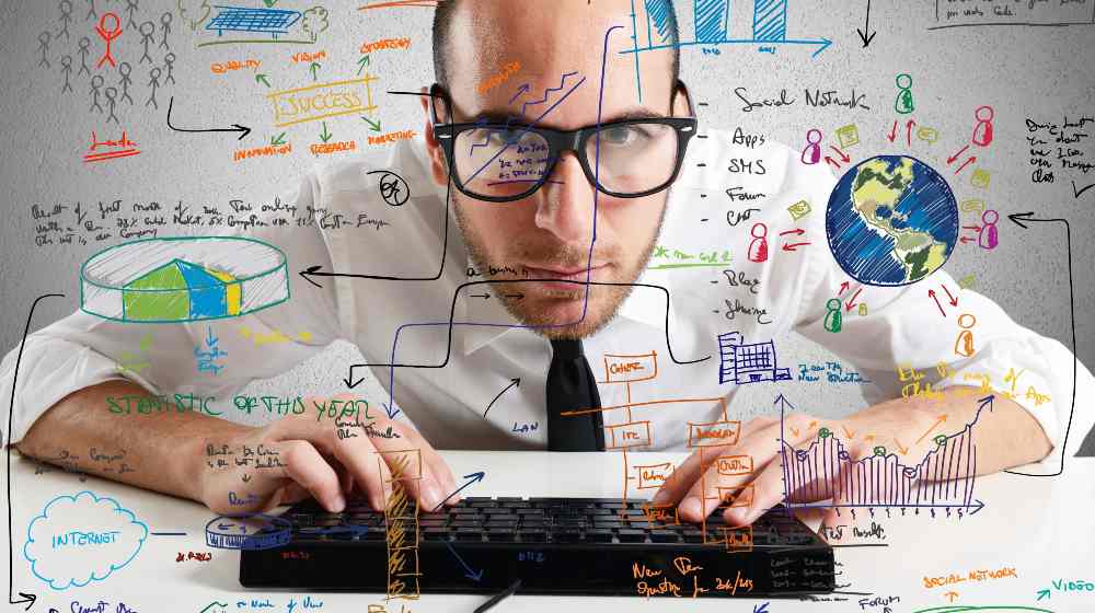 Businessman checking statistics and diagrams on pc | 6 Most Effective Strategies for Growth Hacking | featured