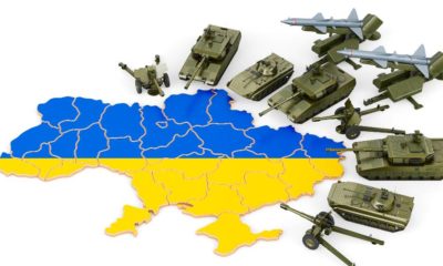 Military attack on Ukraine. Combat vehicles near Ukrainian map | Brent Crude Hits $100 Per Barrel, Gold Prices Rises As Well | featured