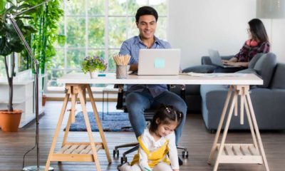 Mixed race family sharing time in living room | 61% of Employees Prefer Working From Home Vs At The Office | featured