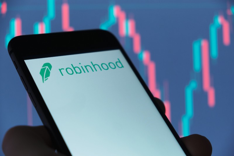 Robinhood logo on smartphone screen, IPO on NASDAQ | Robinhood Collapses 15% (Has Reality Finally Hit Markets)