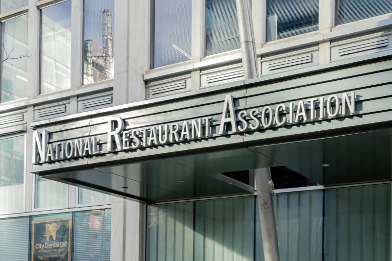Sign of National Restaurant Association above the entrance to their headquarters in Washington, DC | Restaurant Association Now Asking For More Bailout $$$ (Shows Gov Dependency)