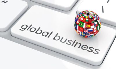 Flags collection sphere on the computer keyboard | BlackRock CEO Warns of End of Globalization Due to Ukraine War | featured