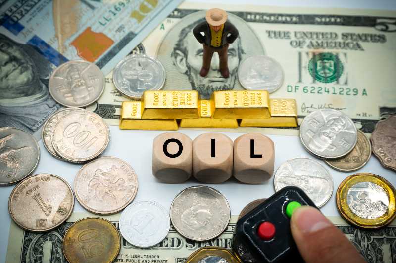The word 'oil' is written on the wooden dice US Gas Prices Set New High Over The Weekend | 