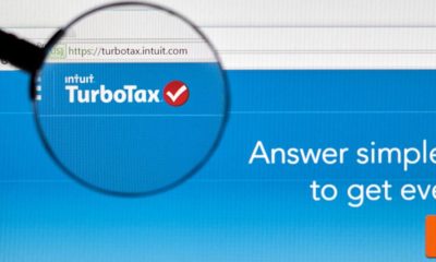 Turbotax page under magnifying glass | TurboTax Isn’t Free Tax Software, FTC Hauls Intuit To Court | featured