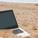 old or obsolete unwanted laptop on the beach | NY Times Confirms Existence of the Hunter Biden Laptop | featured