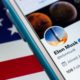 Fidelity Investments - Elon Musk twitter account on iPhone on the US flag | Musk Now Largest Shareholder, Is Twitter Takeover Imminent? 