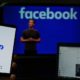 Facebook applicaton and logo in background. Mark Zuckerberg on screen | Security for Mark Zuckerberg Cost Facebook $27M in 2021 | featured