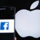 Selective focus on apple logo, Facebook social media app on phone | Apple-Meta Feud Rages Over Insane Fees Charged to Developers | featured