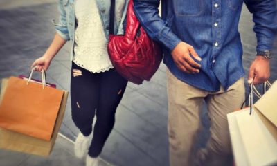 Shopping Couple Capitalism Enjoying Romance Spending Concept | Experts Say Consumer Spending Is Main Driver for Inflation | featured