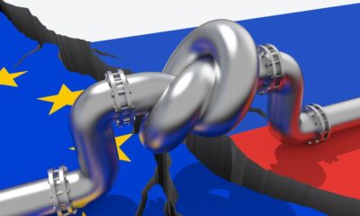 Fuel-gas-pipeline-with-a-knot-on-background-of-European-Union-and-Russian-flags-Russian-Oil-Ban-SS-Featured-.jpeg