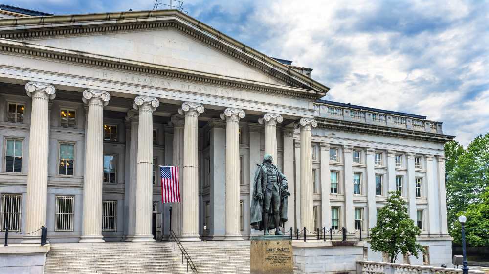 Albert Gallatin Statue US Flag US Treasury Department Washington DC. Statue | Treasury gives more investment freedom | featured