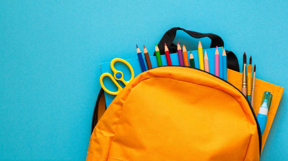 Back to school concept. Backpack with school supplies | America Braces For School Supplies Shortage | featured