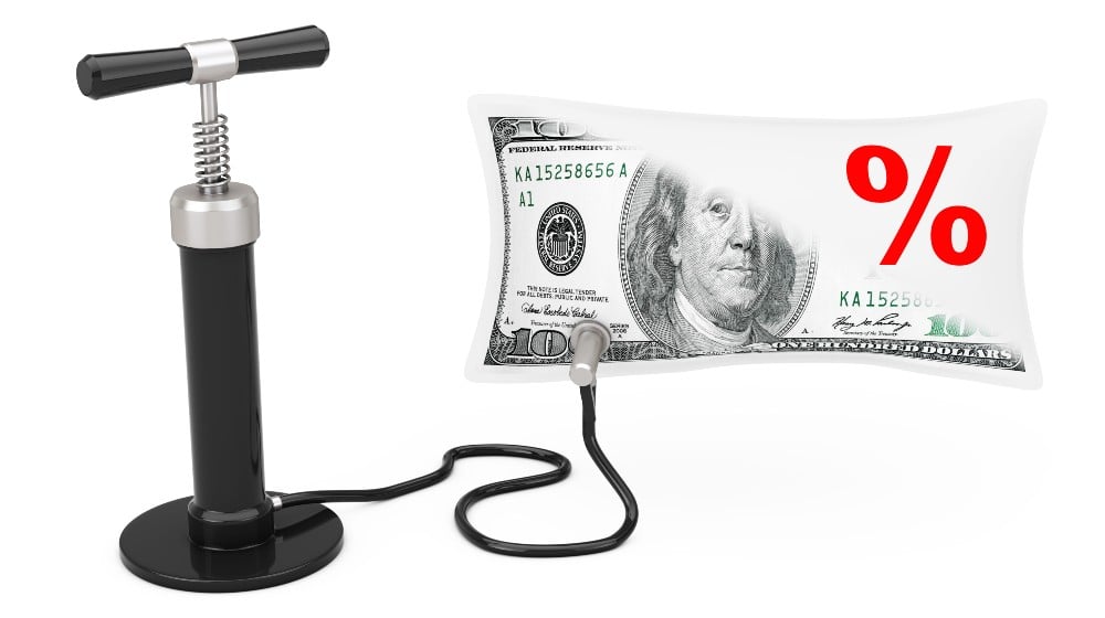 Black Hand Air Pump Inflates US Dollars Balloon with Percent Sign | February Inflation Worse, Food, Gas Prices Hit 40-Year Highs | featured