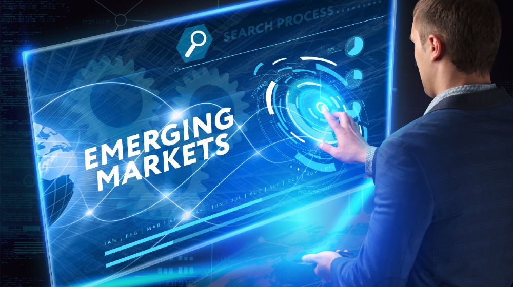 Business man working on the tablet of the future, select on the virtual display emerging markets-Functional Safety-ss-featured