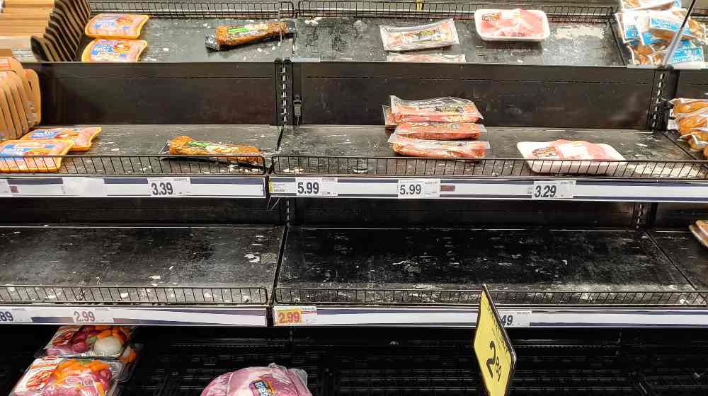 Empty meat department at ruler food's grocery store do to COVID-19 | America’s Food Supply System Is Straining Under Omicron | featured