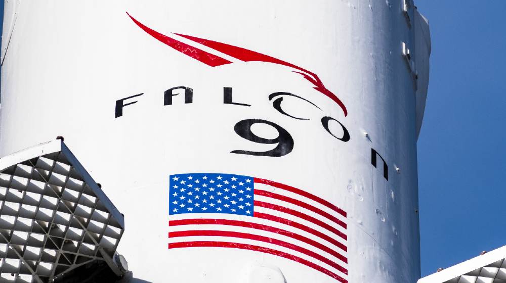 Falcon 9 rocket logo at SpaceX (Space Exploration Technologies Corp.) headquarters | SpaceX To Accept Dogecoin | Featured