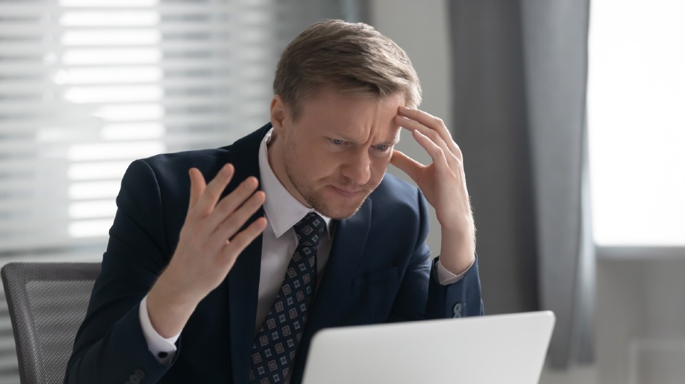 Frustrated businessman work at laptop feel angry confused having software problems | CEO Frustration #4 - Have I Hit the Ceiling As a CEO? | featured