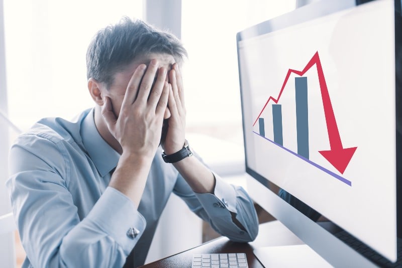 Frustrated stressed shocked business man with financial market chart graphic going down | Inflation Offsets Gains From Pay Hikes