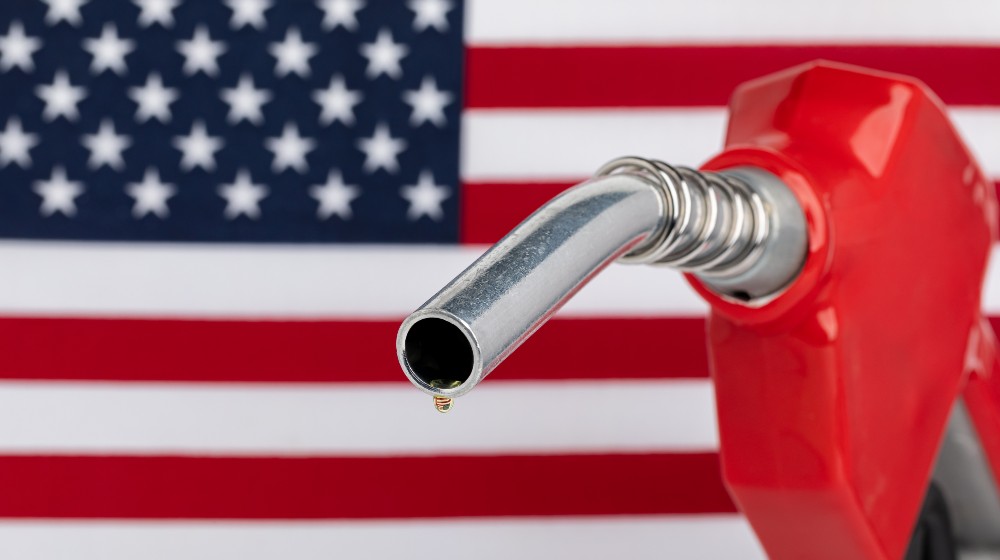 Gas dripping from fuel nozzle with American flag | GOP Governors Suspend The State Gas Tax As Congress Stalls | featured