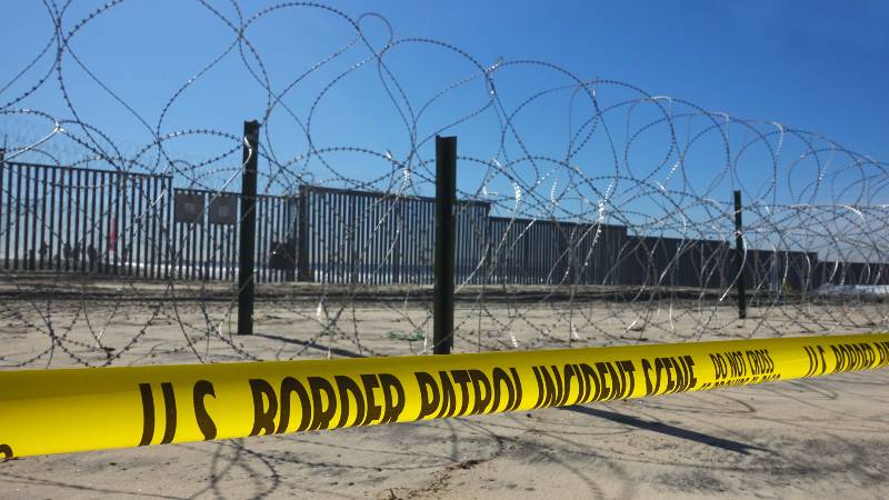 Increased fortifications and barbed wire at the border fence between San Diego and Tijuana after violent clashes with migrant caravan-migrant caravan