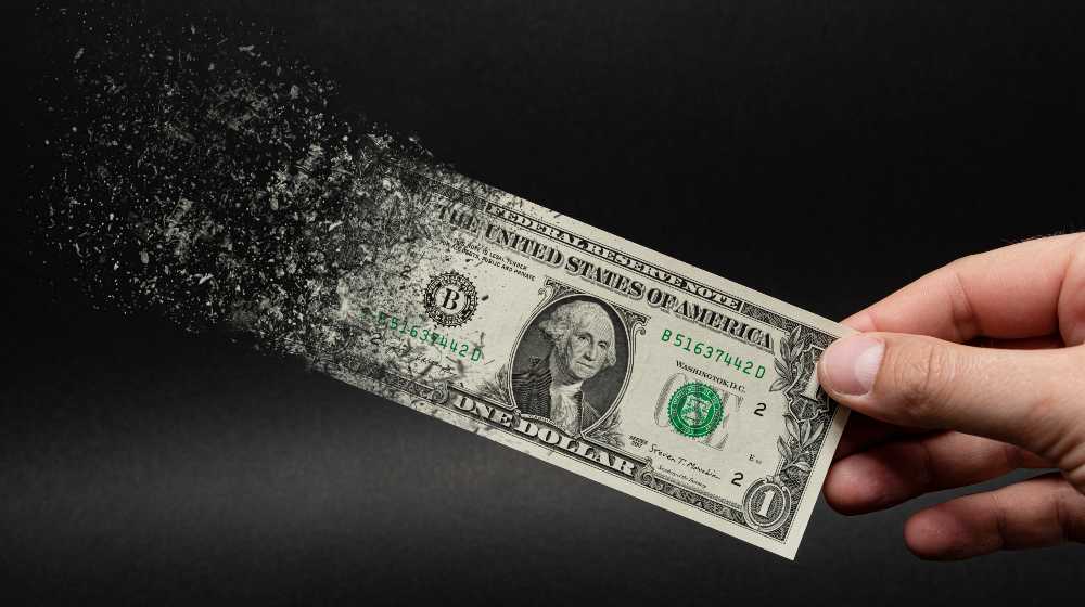 Inflation, dollar hyperinflation with black background | How To Prepare For Hyperinflation | featured