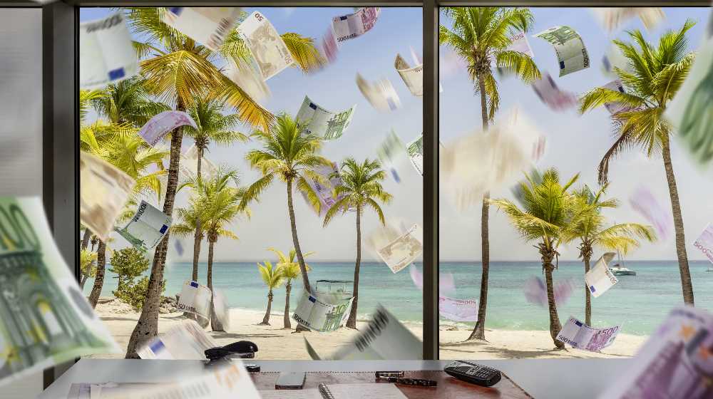 Offshore banking and tax havens concept at the beach | Pandora Papers Reveal How The World’s Wealthiest Hide Assets | featured