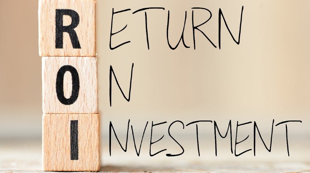 Return on Investment, ROI. Cube wooden block with alphabet building the word ROI | Get More From Influencer Campaigns: The Secret For Extending ROI | Featured