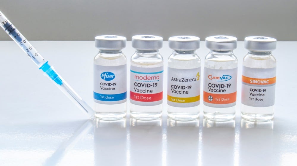 Several vials vaccine bottles of covid-19 immunization popular vaccines brands in the world | WHO Warns Against Mixing Different COVID-19 Vaccine Brands | featured