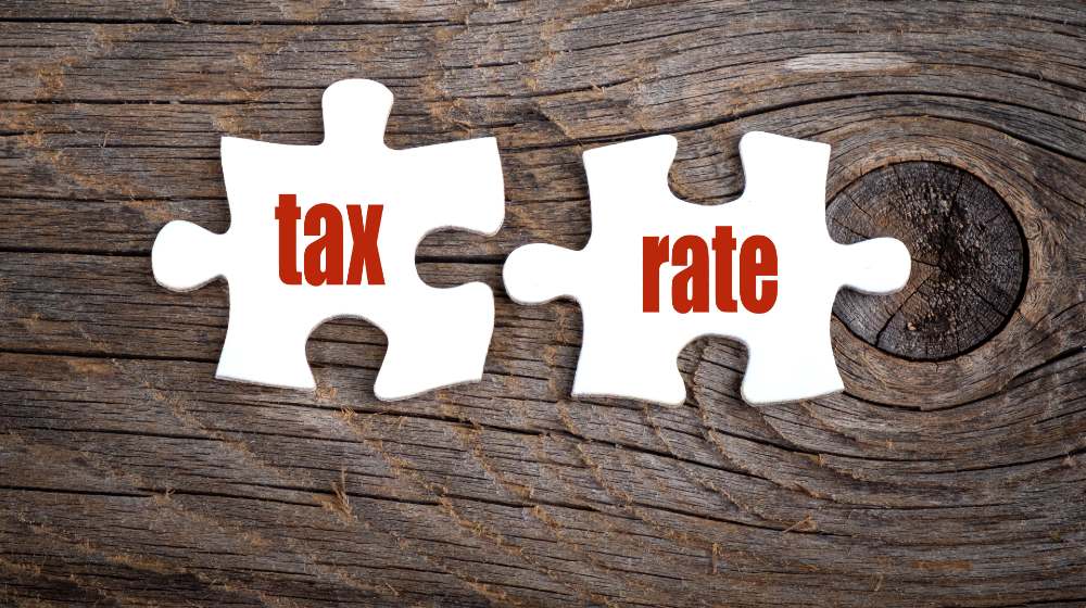 Tax Rate - words on puzzle-Biden's Tax Plan Rates-ss-featured