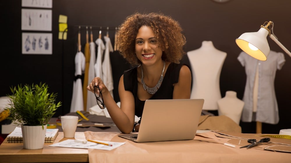 Two young entrepreneur women, and fashion designer working on her atelier | How to Project Confidence as an Entrepreneur | featured