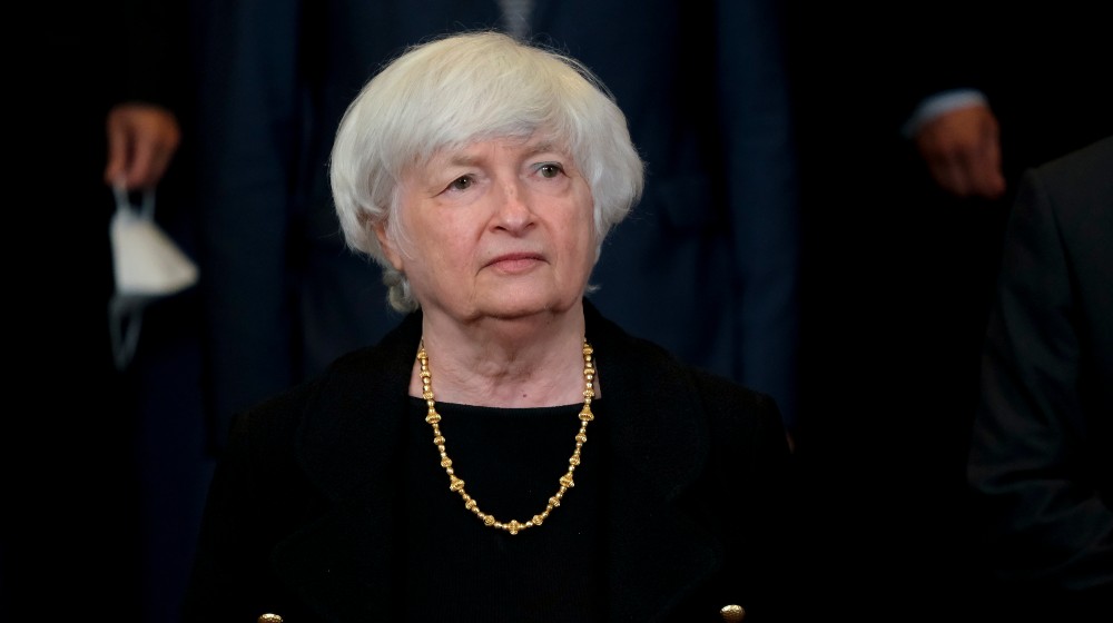 US Treasury Secretary Janet Yellen arrives to attends during a meeting of Eurogroup Finance Ministers | Biden Wants Banks To Report Transactions Above $600 | featured