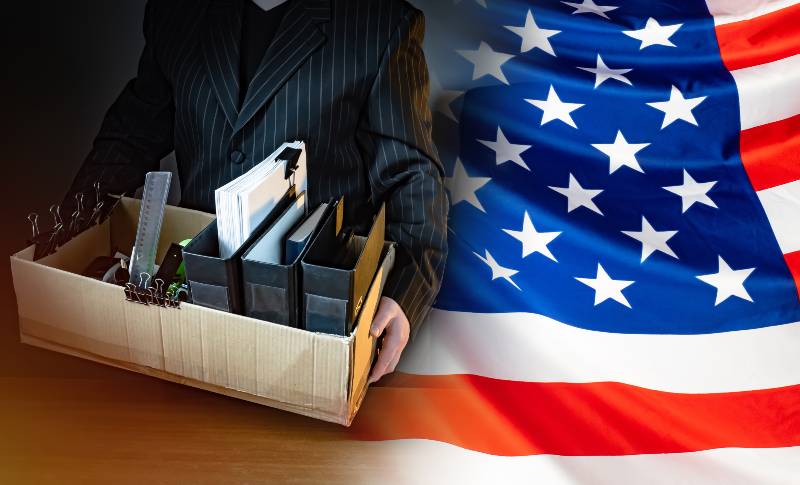 Unemployed. Man holds a box with personal belongings | Latest Jobless Report Lists 214,000
