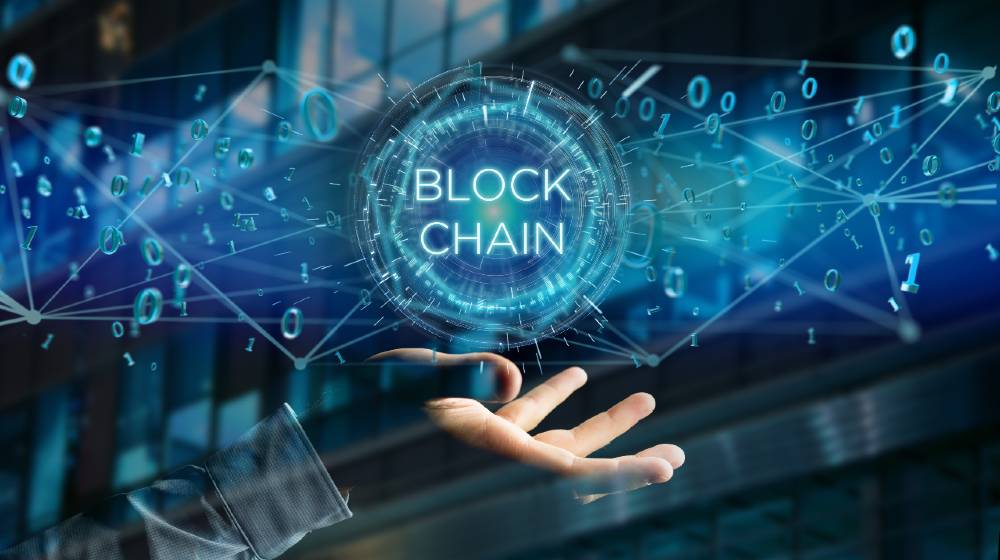 View of a Blockchain title with 0 and 1 data flying over | What Is the Meaning of Blockchain? | featured