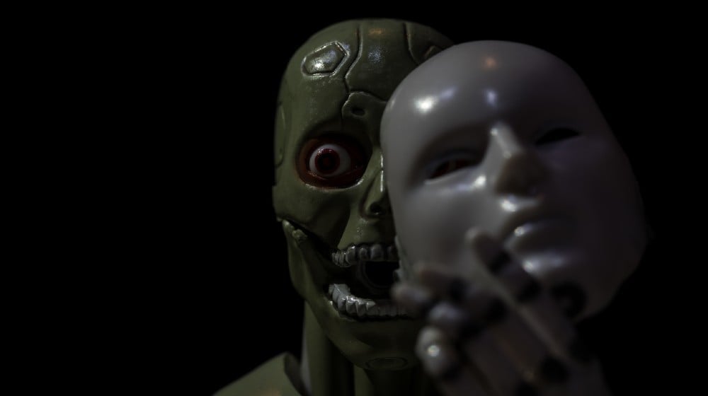 abstract face of artificial intelligence robot and mask off on black background in horror-ai-superpower-ss-featured