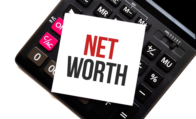 calculator with text net worth with white paper | Calculating Your Net Worth