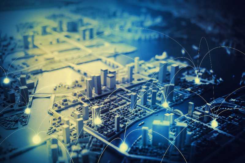 duotone graphic of smart city diorama and communication network concept | Joey Levin - Building an Anti-Conglomerate
