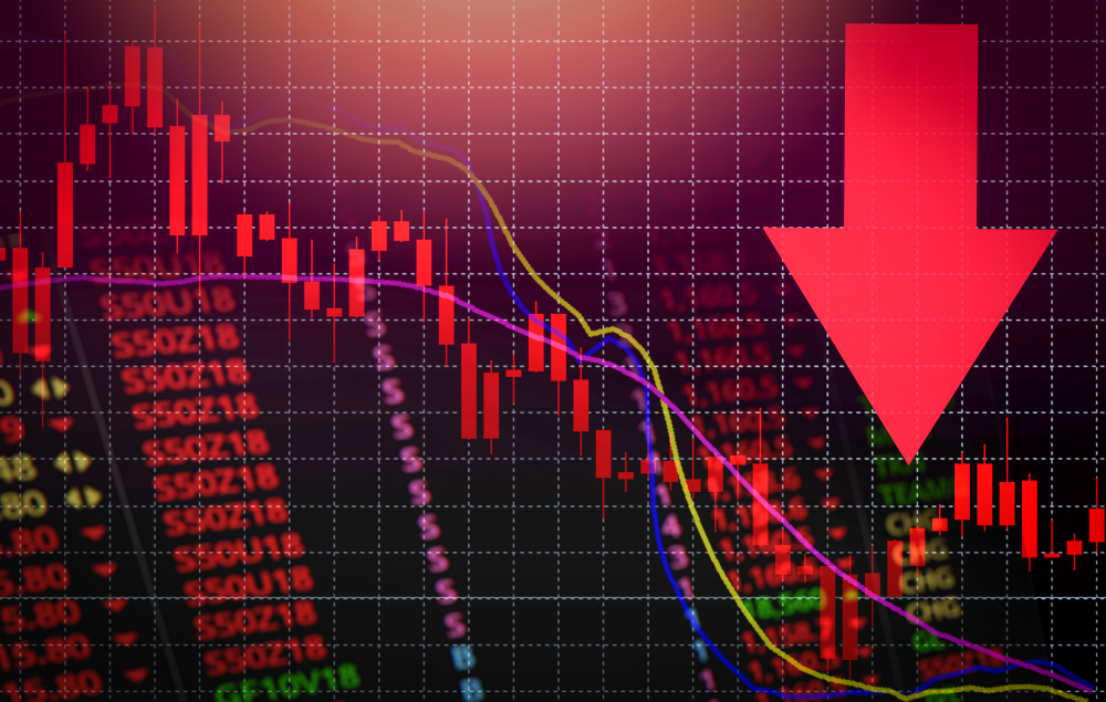 stock market graph representing negative economic outlook