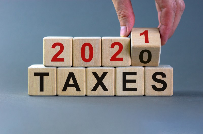 wooden cube and change the inscription 'Taxes 2020' to 'Taxes 2021' | 11 Billion